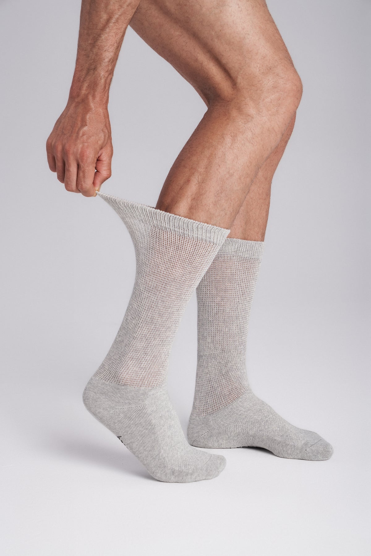 Men's Diabetic Non-Binding Socks — cuff being stretched open