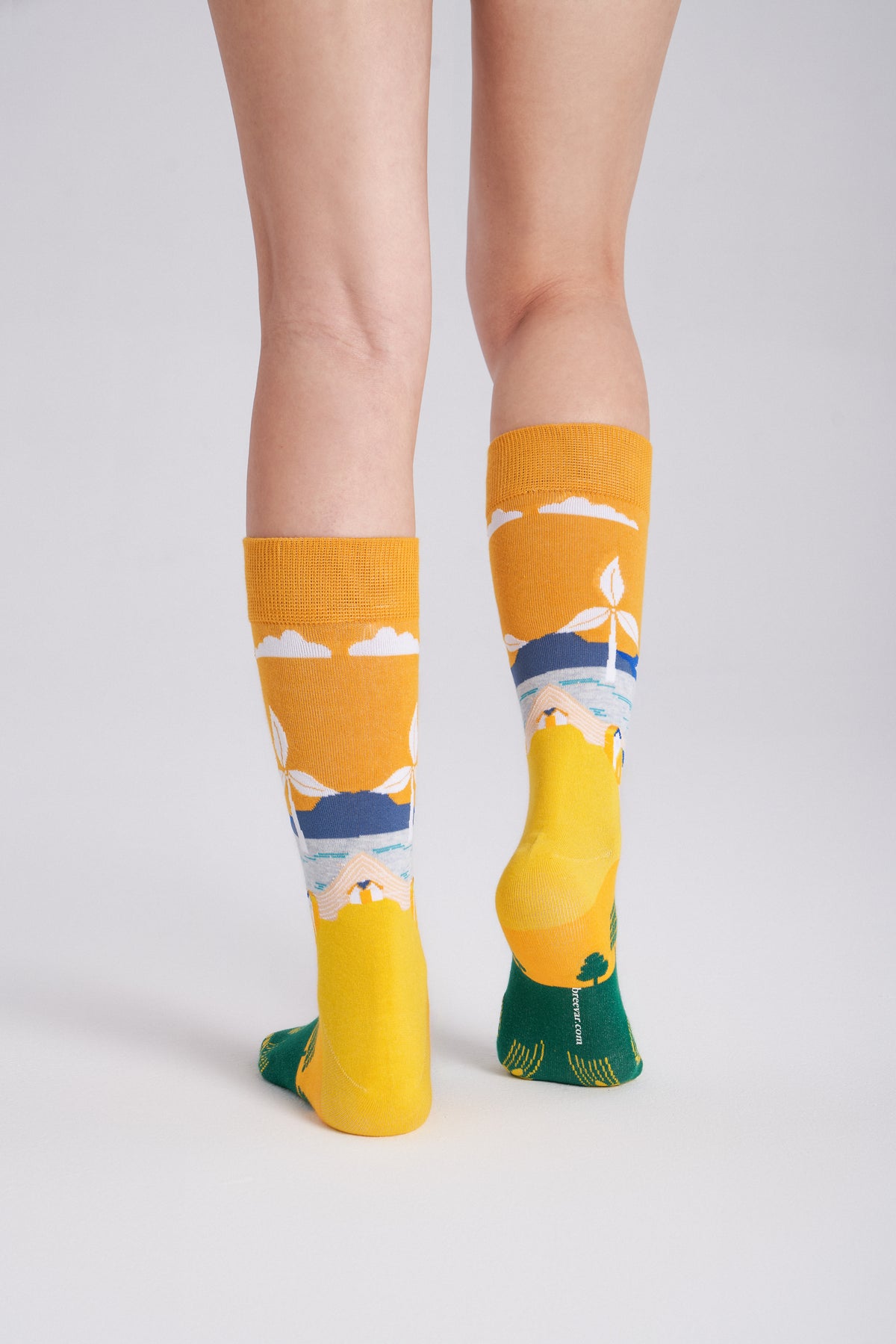 12-Pack Collectible Art Crew Socks – Clean Energy & Climate Action — heel shape and crew cuff on foot