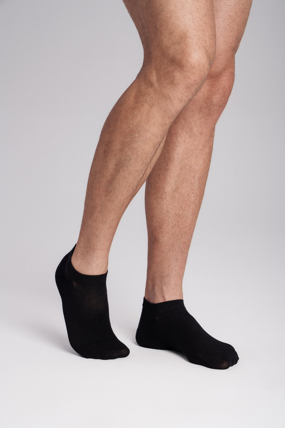 Soft women’s antibacterial ankle socks with massage sole design, breathable fabric, comfortable fit, and odor-resistant material—perfect for daily wear and foot care.