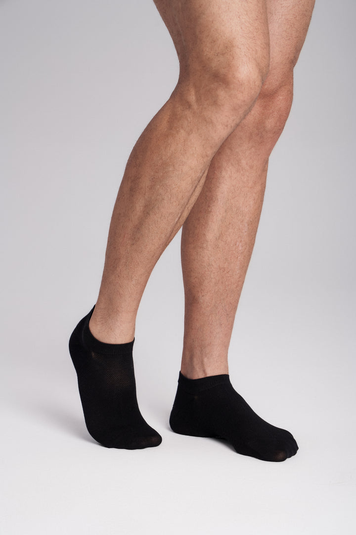 Soft women’s antibacterial ankle socks with massage sole design, breathable fabric, comfortable fit, and odor-resistant material—perfect for daily wear and foot care.