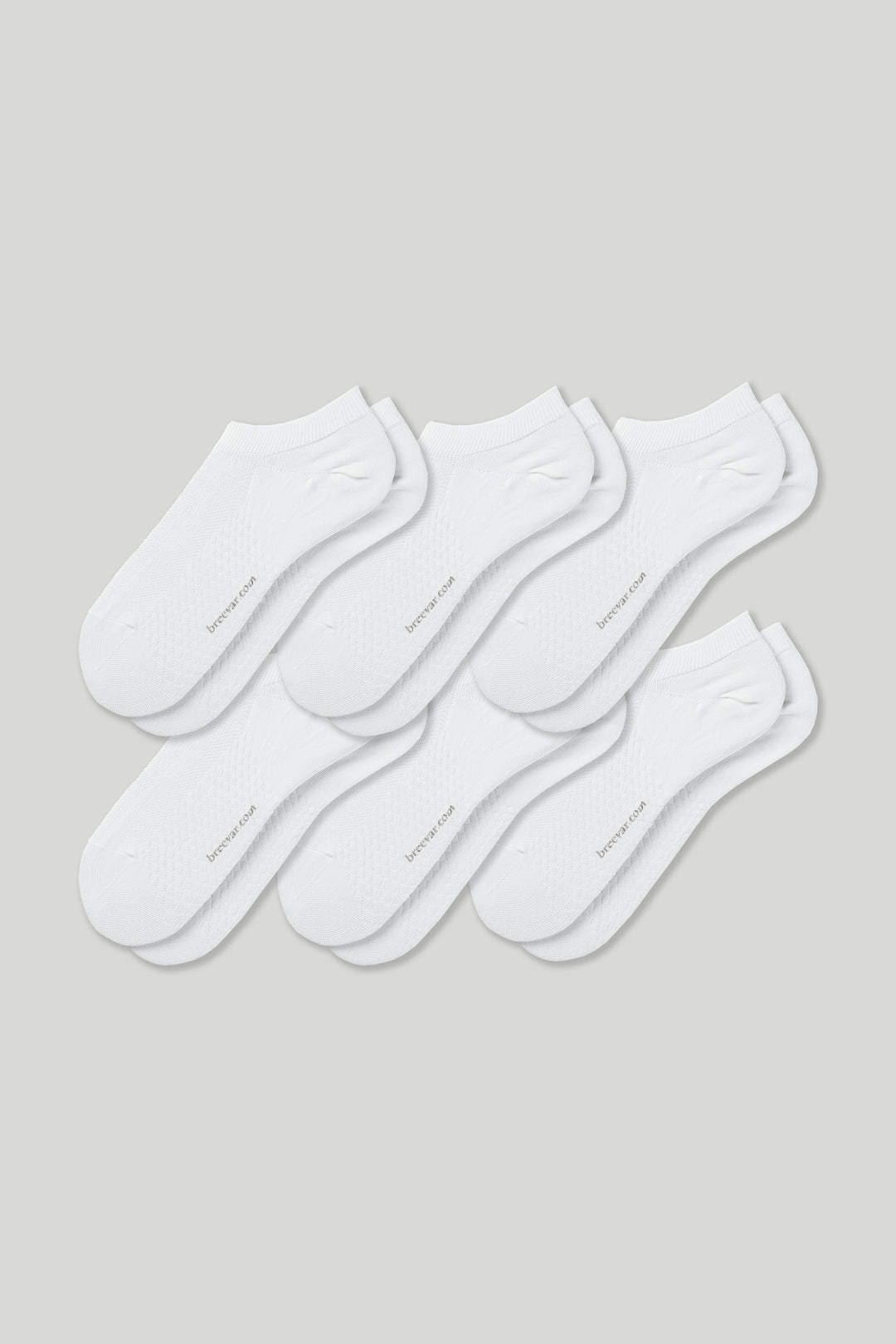 Soft women’s antibacterial ankle socks with massage sole design, breathable fabric, comfortable fit, and odor-resistant material—perfect for daily wear and foot care.