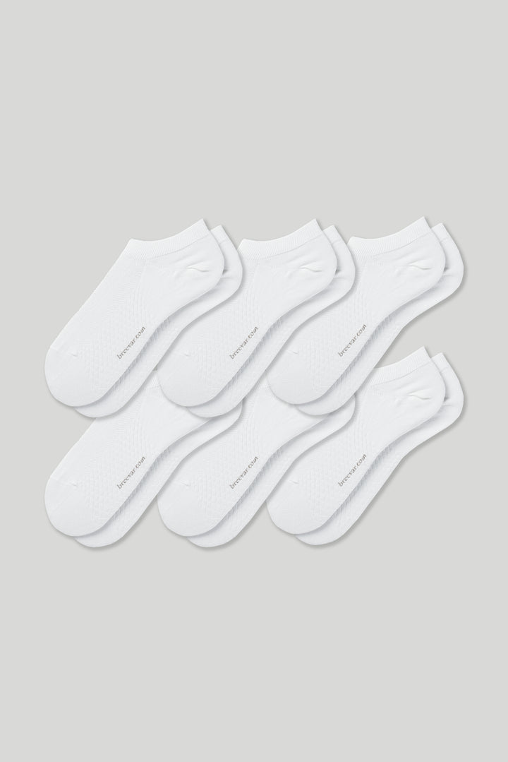 Soft women’s antibacterial ankle socks with massage sole design, breathable fabric, comfortable fit, and odor-resistant material—perfect for daily wear and foot care.