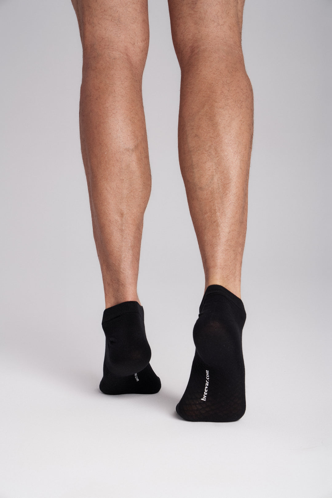 Soft women’s antibacterial ankle socks with massage sole design, breathable fabric, comfortable fit, and odor-resistant material perfect for daily wear and foot care.