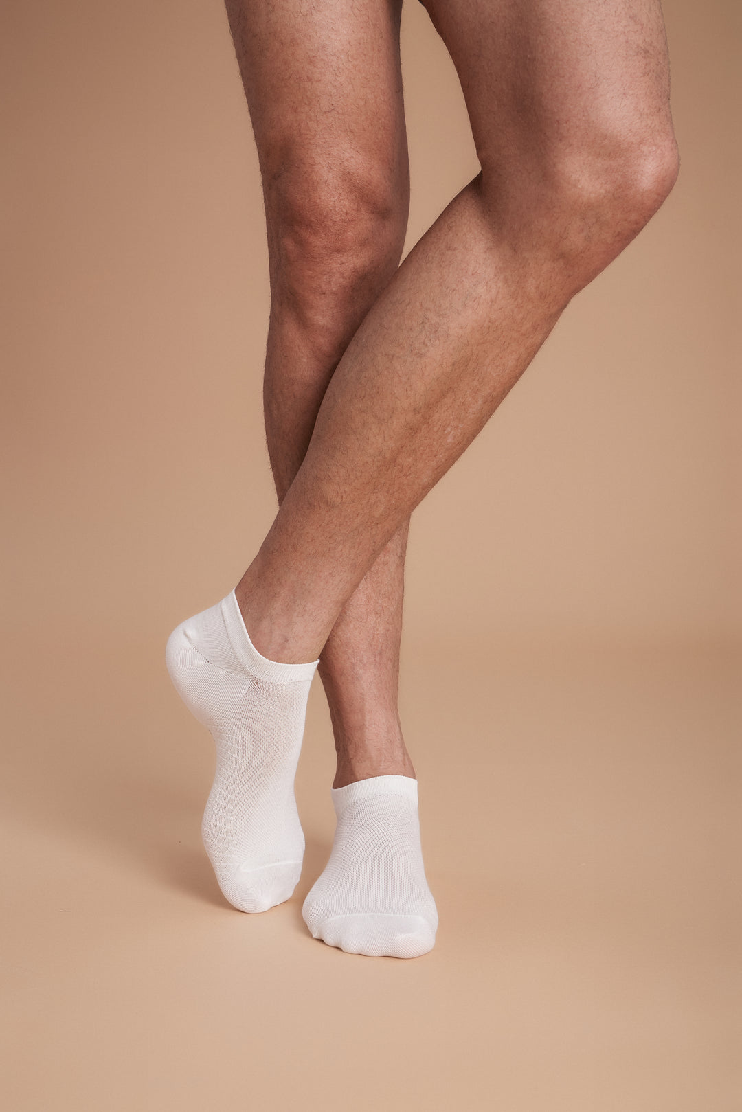 Soft women’s antibacterial ankle socks with massage sole design, breathable fabric, comfortable fit, and odor-resistant material—perfect for daily wear and foot care.