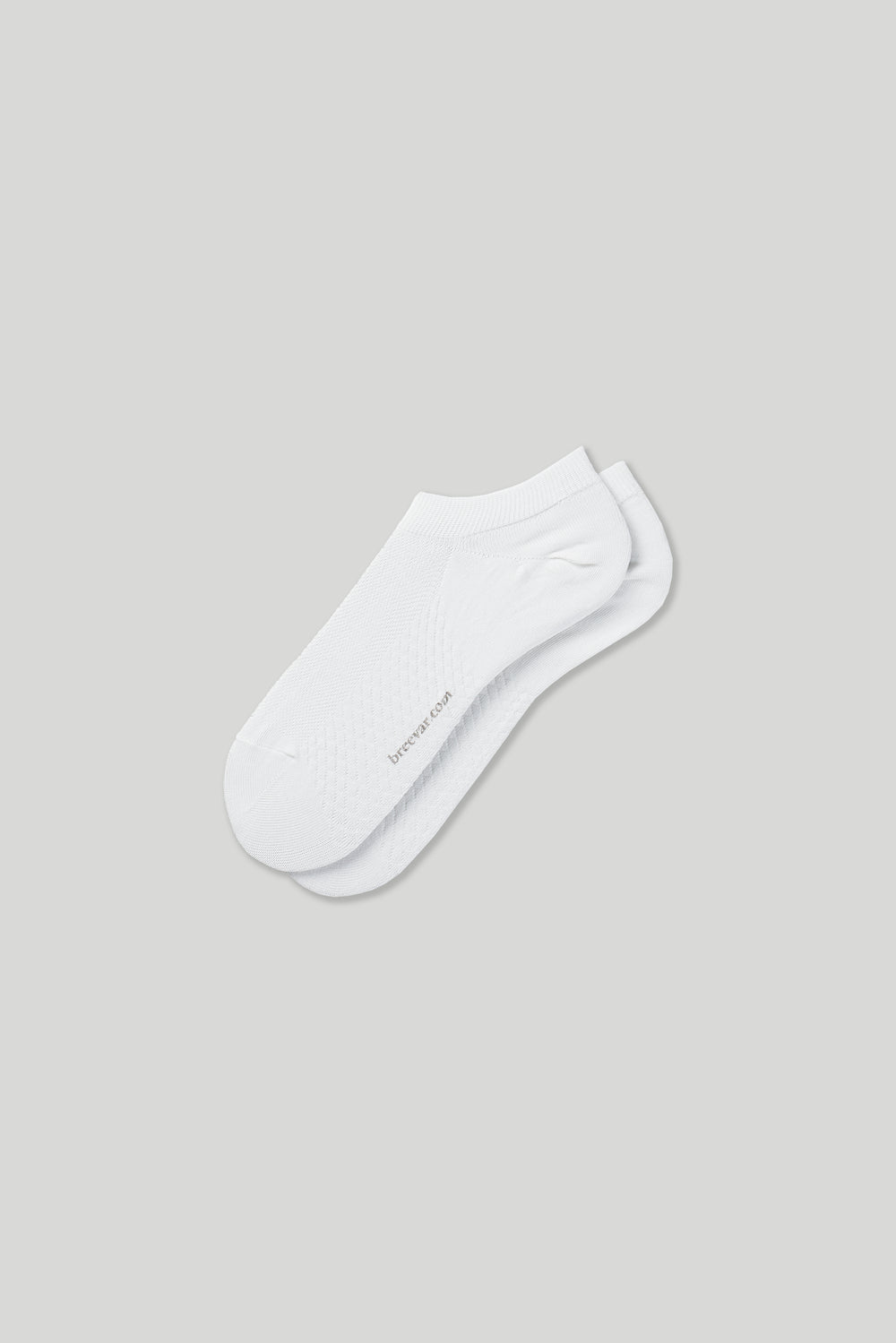 Soft women’s antibacterial ankle socks with massage sole design, breathable fabric, comfortable fit, and odor-resistant material—perfect for daily wear and foot care.