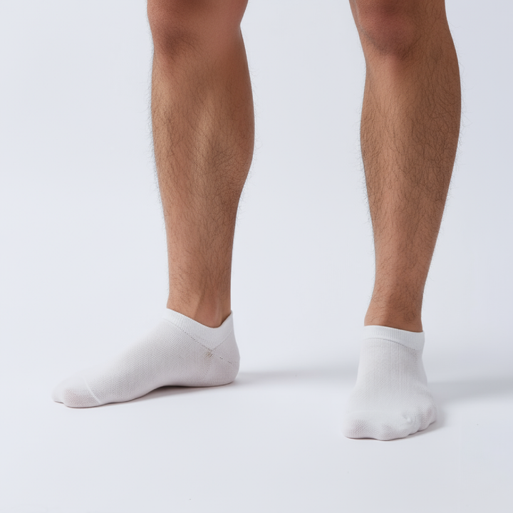 Soft women’s antibacterial ankle socks with massage sole design, breathable fabric, comfortable fit, and odor-resistant material perfect for daily wear and foot care.