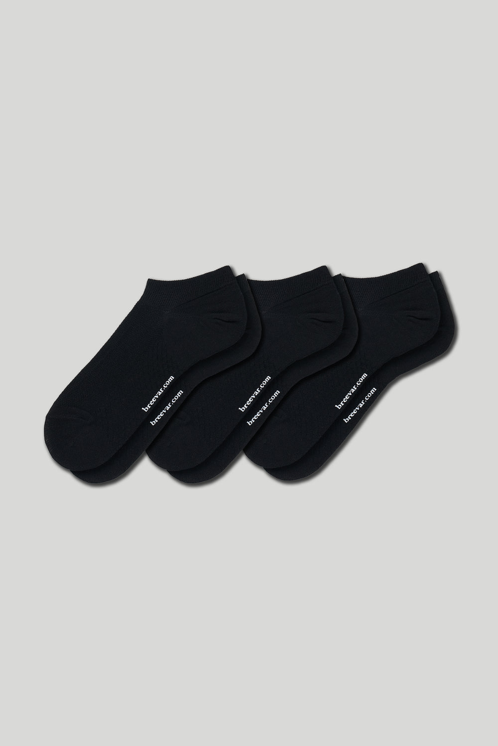 Soft women’s antibacterial ankle socks with massage sole design, breathable fabric, comfortable fit, and odor-resistant material perfect for daily wear and foot care.