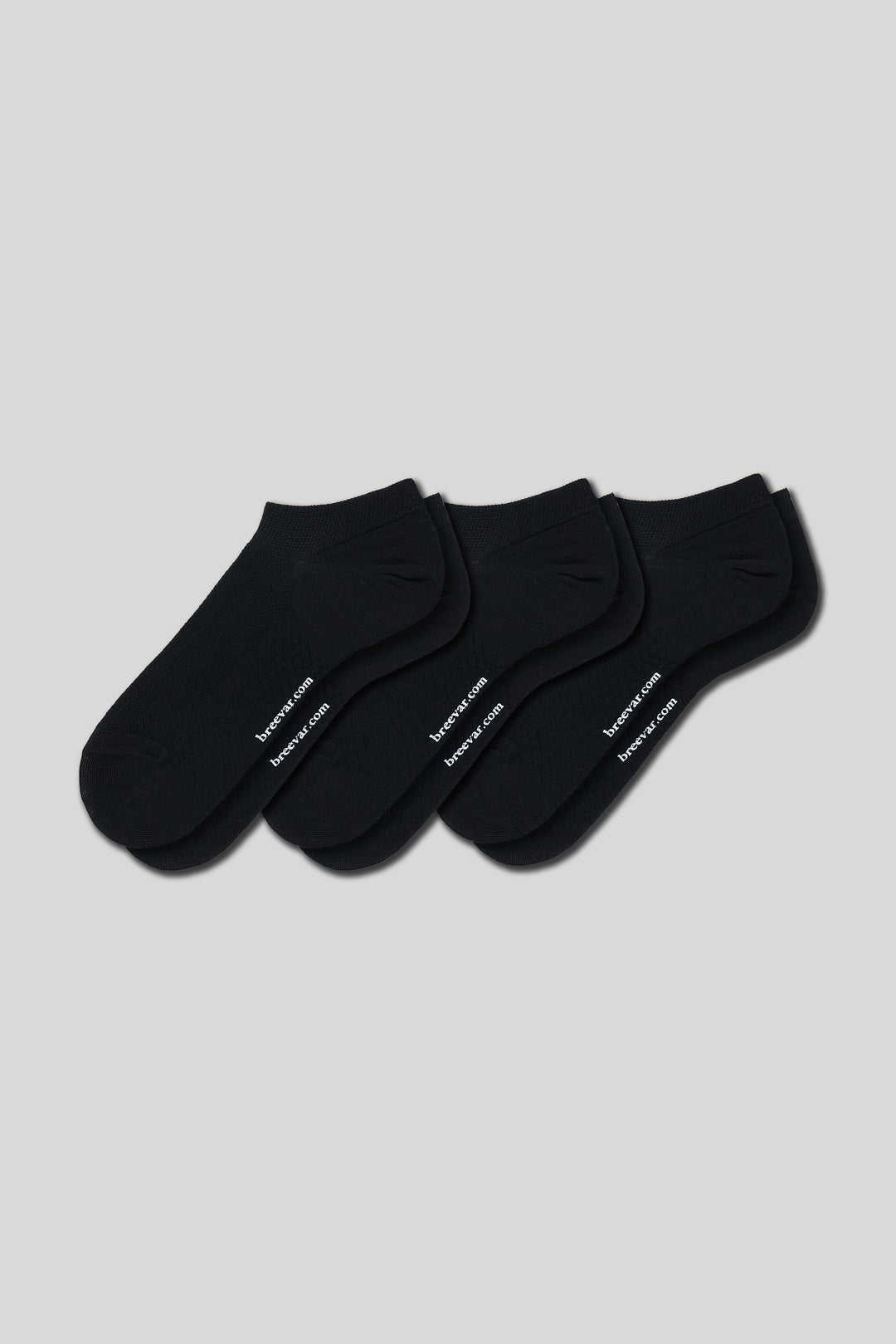 Soft women’s antibacterial ankle socks with massage sole design, breathable fabric, comfortable fit, and odor-resistant material perfect for daily wear and foot care.
