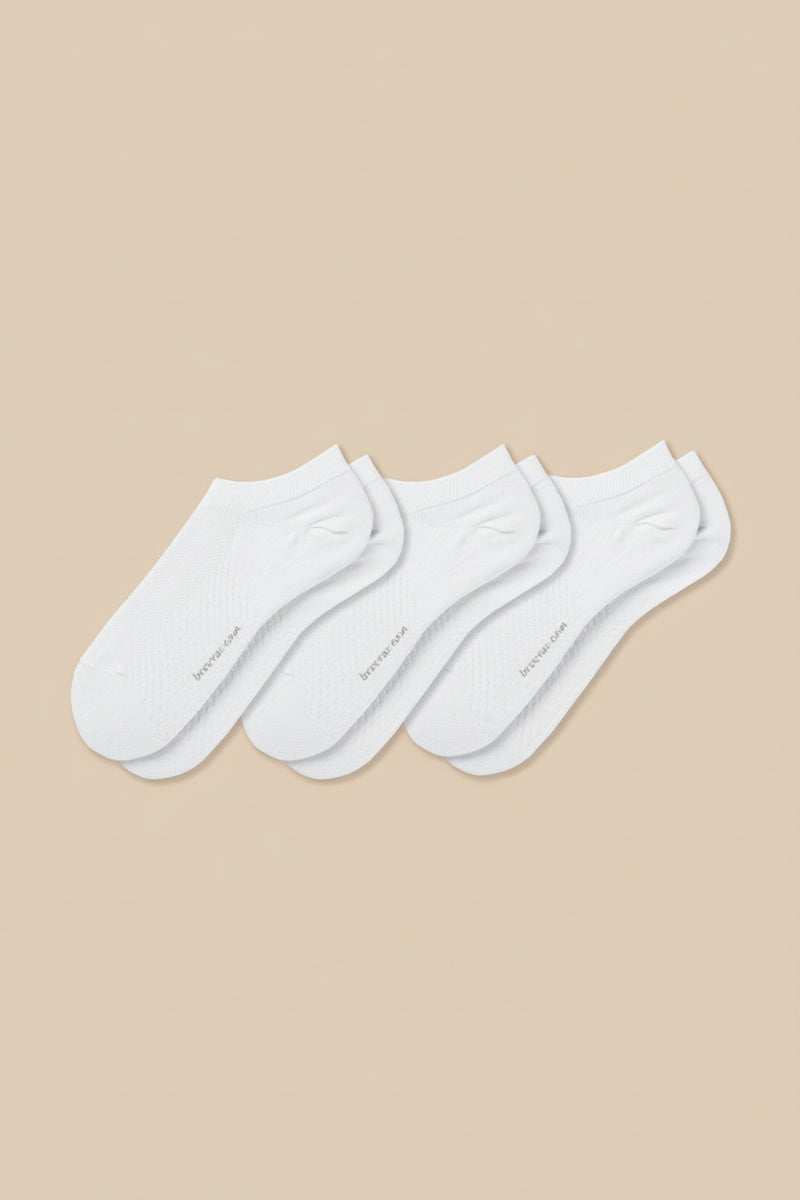 Soft women’s antibacterial ankle socks with massage sole design, breathable fabric, comfortable fit, and odor-resistant material perfect for daily wear and foot care.