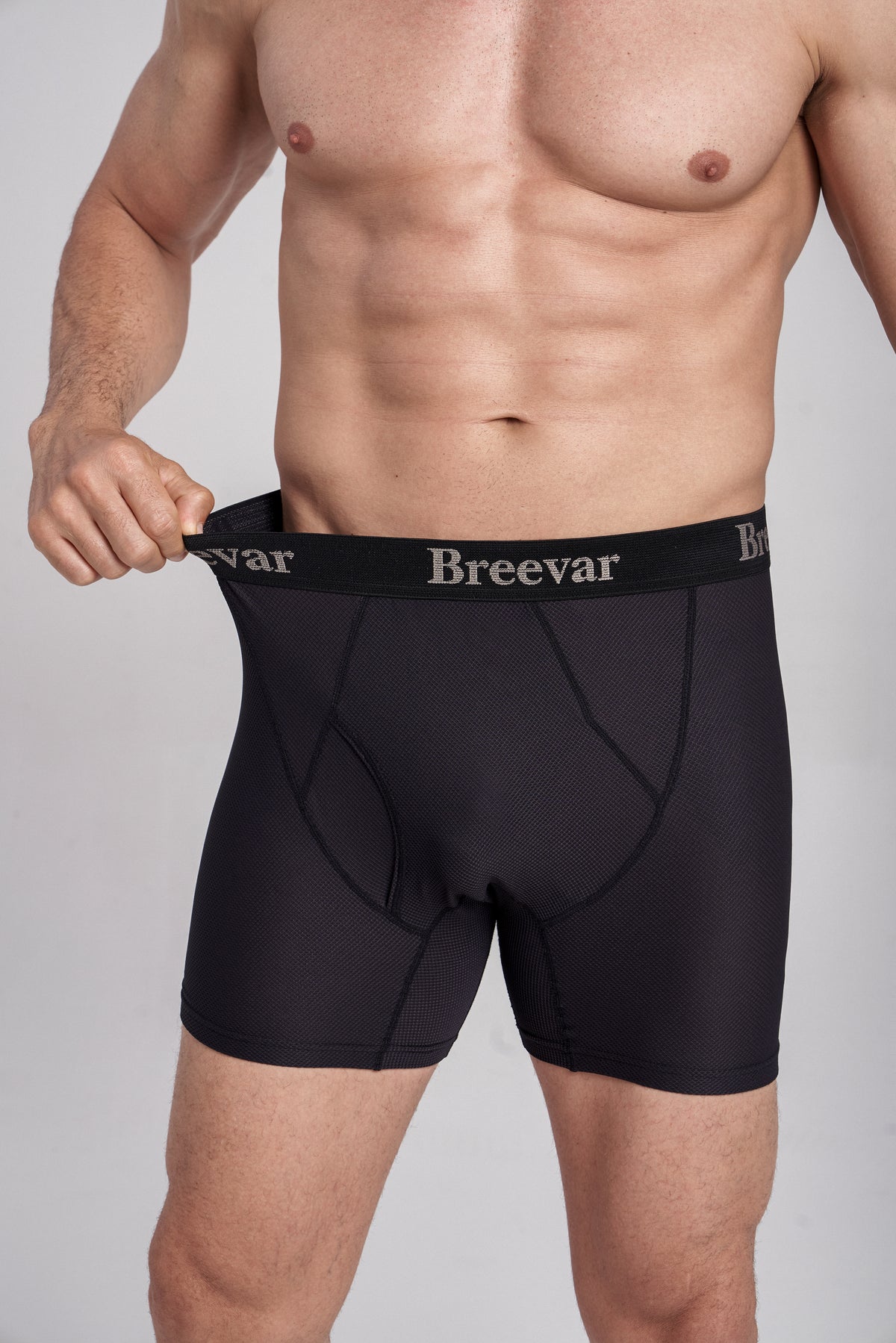 3-Pack Men's Mesh Performance Quick Dry Boxer Briefs — hand pulling waistband