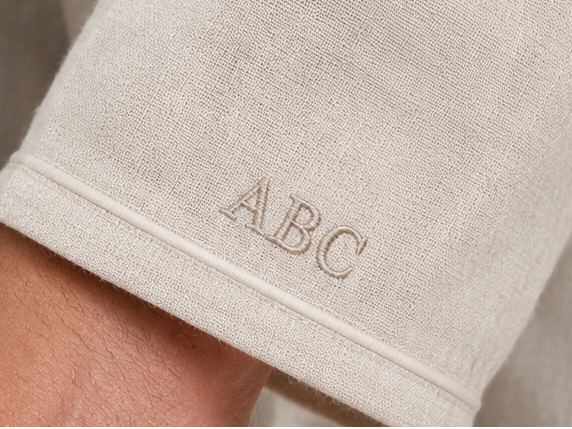 breevar monogram text personalization on sleepwear cuff