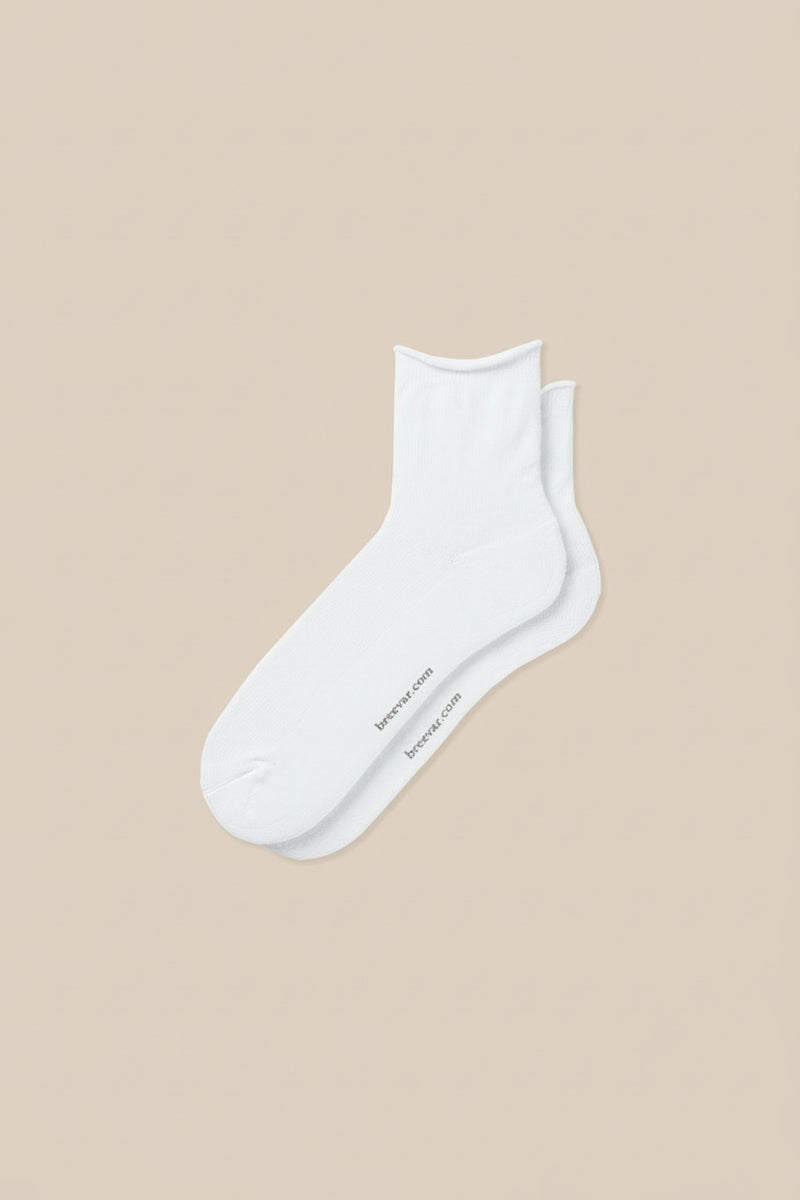 White roll top socks displayed flat