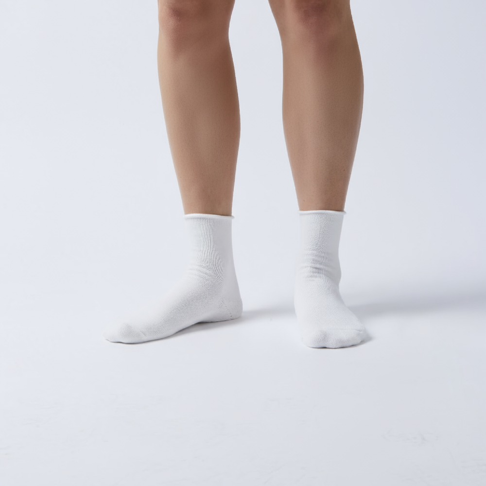 Soft women’s roll top socks with a comfortable non-binding cuff, breathable cotton blend, and classic ankle length—perfect for everyday wear.
